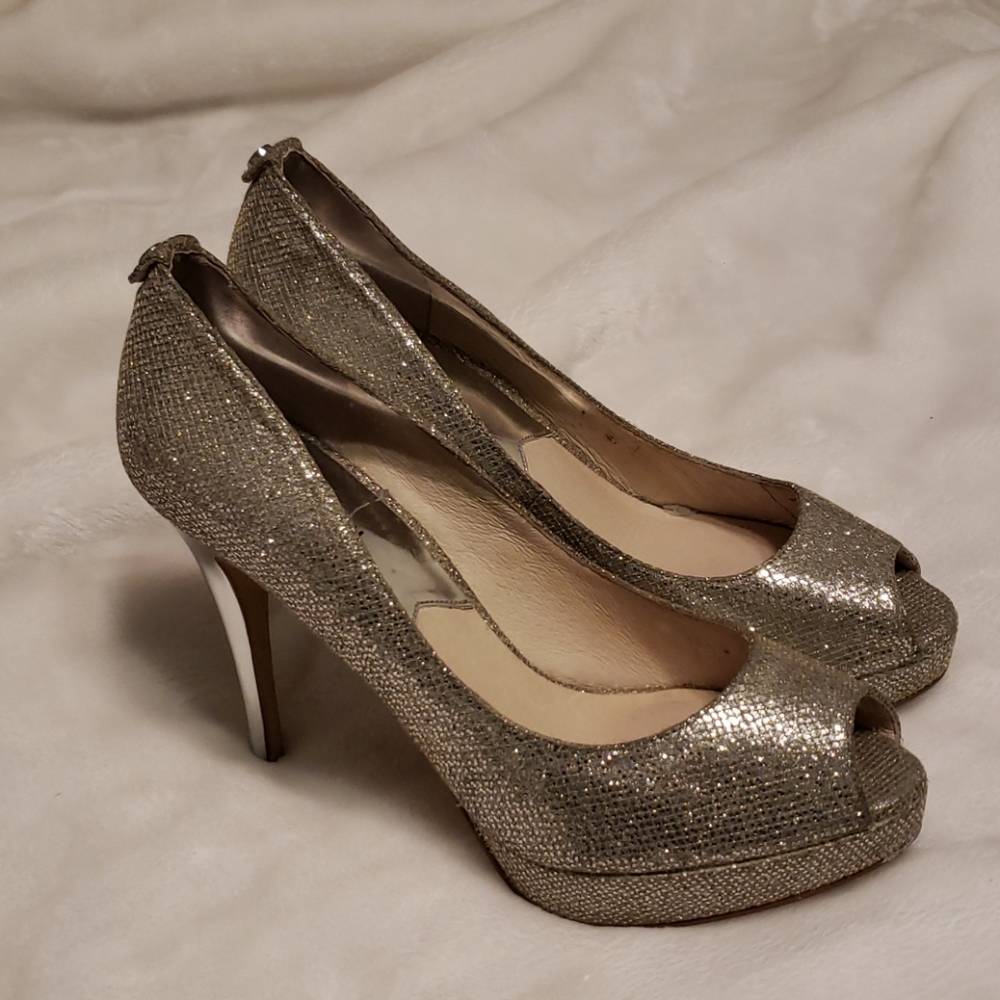 MK platform stilettos, sparkly metallic